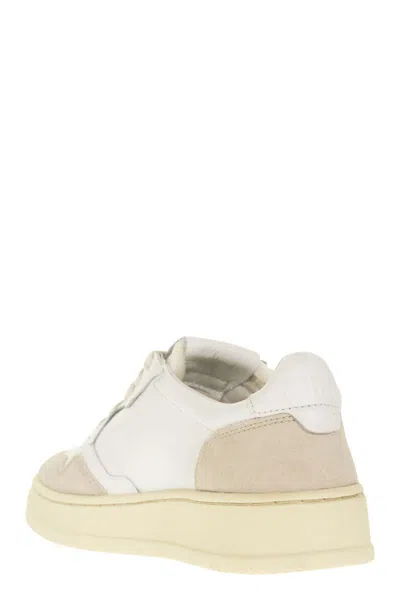 Autry Low Sneaker With Perforated Detailing And Contrast Panel In White