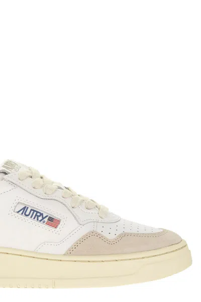 Autry Low Sneaker With Perforated Detailing And Contrast Panel In White