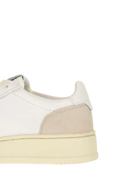 Autry Low Sneaker With Perforated Detailing And Contrast Panel In White