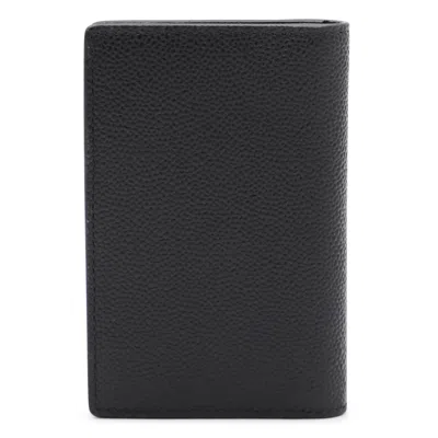 Tod's Textured Finish Wallets For A Sophisticated Look In Black