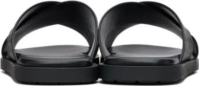 Ferragamo Monogram-embossed Leather Slides In Black