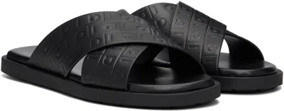 Ferragamo Monogram-embossed Leather Slides In Black