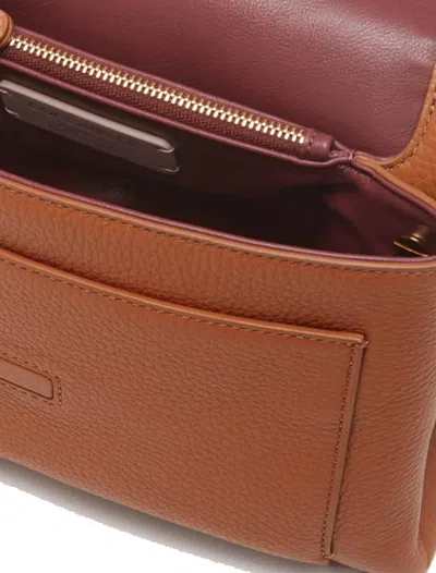 Coccinelle Dorian Shoulder Bag In Brown