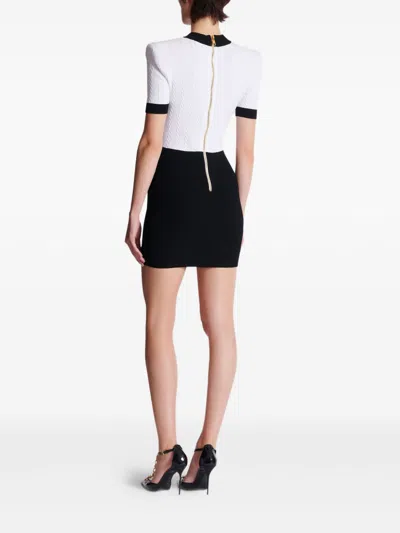 Balmain Fitted Black Dress With Ribbed Texture And Gold Accents In Black