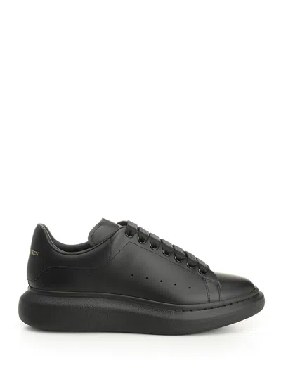 Alexander Mcqueen Black Sneakers With Logo Lettering On The Rear And Oversize Rubber Sole In Leather