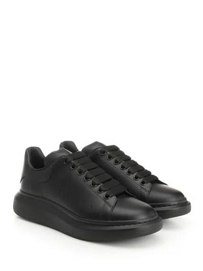 Alexander Mcqueen Black Sneakers With Logo Lettering On The Rear And Oversize Rubber Sole In Leather