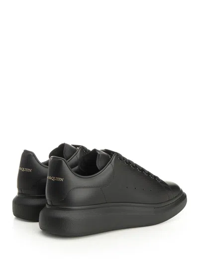 Alexander Mcqueen Black Sneakers With Logo Lettering On The Rear And Oversize Rubber Sole In Leather