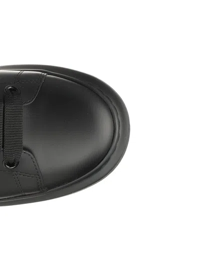 Alexander Mcqueen Black Sneakers With Logo Lettering On The Rear And Oversize Rubber Sole In Leather