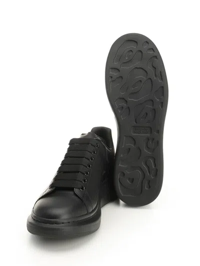 Alexander Mcqueen Black Sneakers With Logo Lettering On The Rear And Oversize Rubber Sole In Leather