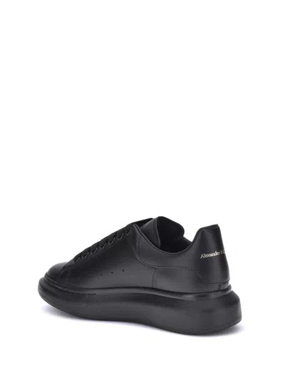 Alexander Mcqueen Black Sneakers With Logo Lettering On The Rear And Oversize Rubber Sole In Leather