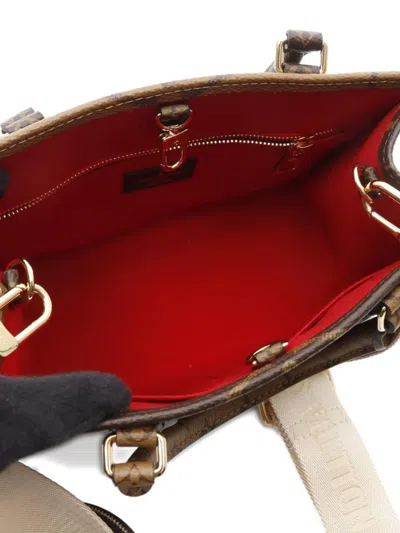 Pre-owned Louis Vuitton 2010 On-the-go Pm Handbag In Brown