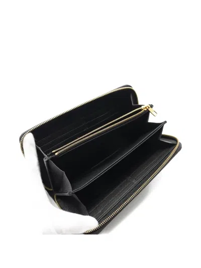 Pre-owned Louis Vuitton 2019 Zppy Monogram Empreinte Leather Wallet In Black