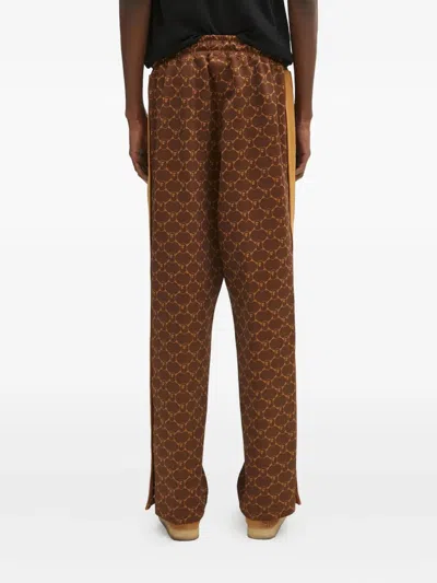 A Bathing Ape Logo-print Side-stripe Trousers In Brown