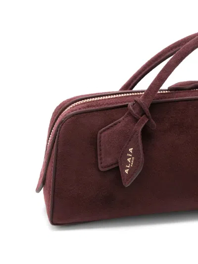 Alaïa Le Teckel Leather-trimmed Suede Clutch