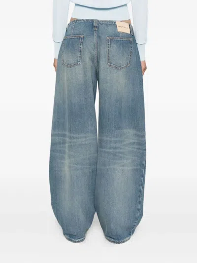 Alexander Mcqueen Wide-leg Denim Trousers Featuring Faded Effect In Blue