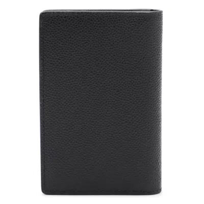 Tod's Textured Finish Wallets For A Sophisticated Look In Black
