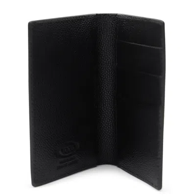 Tod's Textured Finish Wallets For A Sophisticated Look In Black