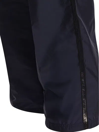 Prada Drawstring Elastic Waist Casual Pants In Blue