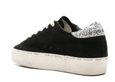 Golden Goose Deluxe Brand Black Sneakers With Iconic Star Design And Glitter Accents