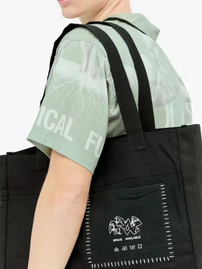Space Available Patch Pocket Tote Bag In Black