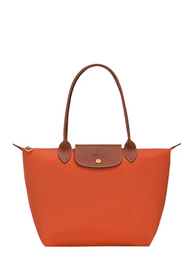 Longchamp 'le Pilage Original' Red Medium Tote Bag With Two Top Handles And Embossed Logo On The Front In Canv
