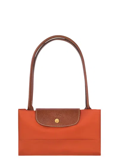 Longchamp 'le Pilage Original' Red Medium Tote Bag With Two Top Handles And Embossed Logo On The Front In Canv
