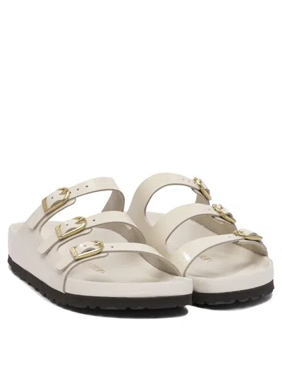 Birkenstock Triple Buckle Open Toe Flat Sole Sandals In Neutral