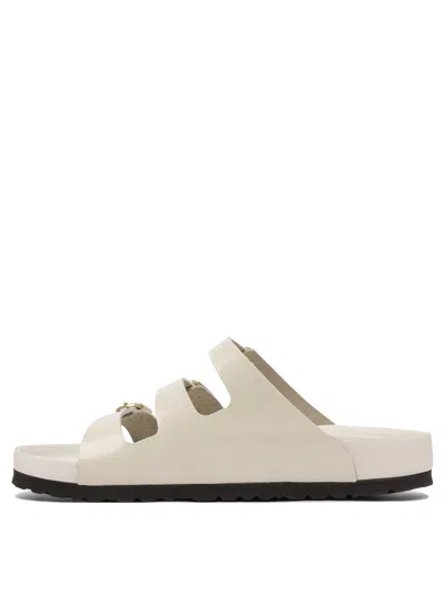 Birkenstock Triple Buckle Open Toe Flat Sole Sandals In Neutral