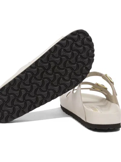 Birkenstock Triple Buckle Open Toe Flat Sole Sandals In Neutral