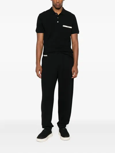 Moschino Zip-pocket Cuffed Trousers In Black