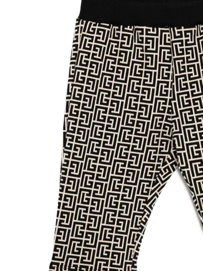 Balmain Monogram-pattern Trousers In Black