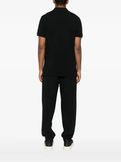 Moschino Logo-print Polo Shirt In Black