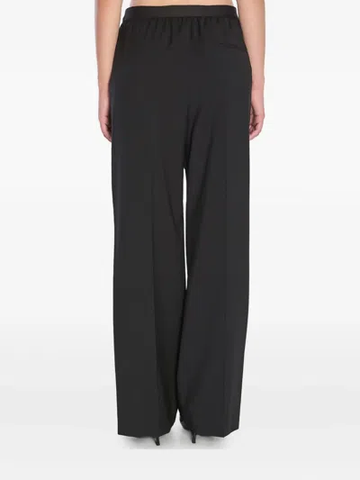 Loewe Logo Wool Trousers In Black