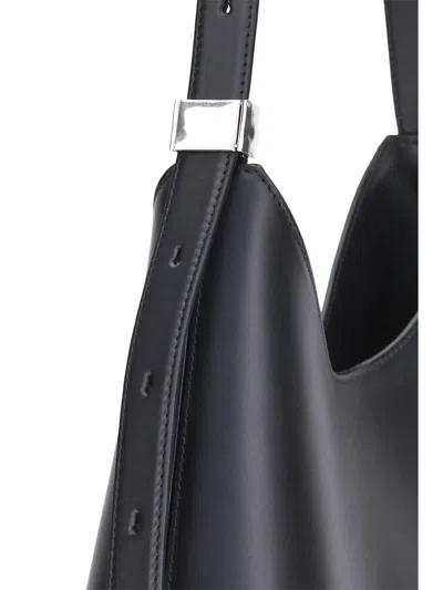 Jil Sander Crescent-shaped Shoulder Bag With Adjustable Strap In Black