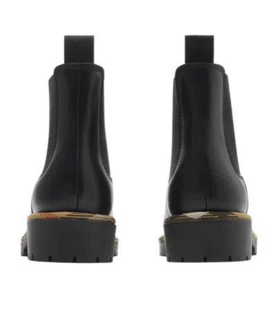 Burberry Smooth Leather Boots With Mesh Side Panels And Textured Detailing In Black
