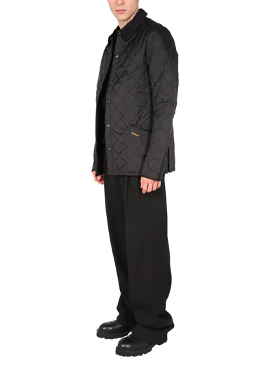 Barbour 'heritage Liddesdale' Black Jacket With Classic Corduroy Collar And Logo Lettering On The Front In T In Black