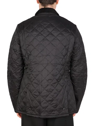 Barbour 'heritage Liddesdale' Black Jacket With Classic Corduroy Collar And Logo Lettering On The Front In T In Black