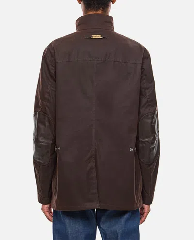 Barbour Waxed Jacket With Elbow Patches And High Neck In Brown