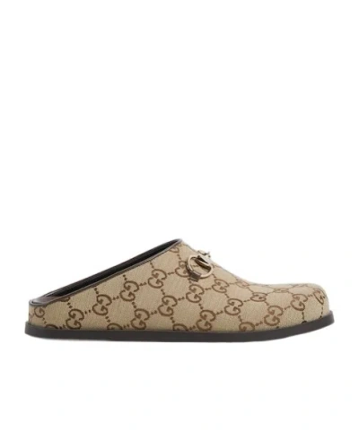 Gucci Gg Monogram Horsebit Flat Mules In Brown