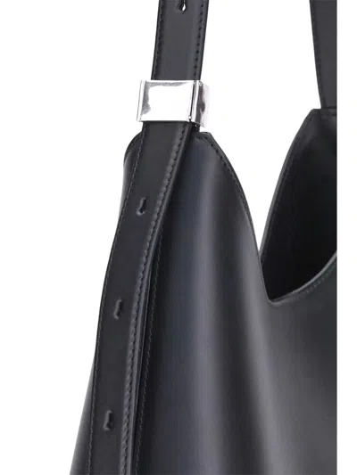Jil Sander Crescent-shaped Shoulder Bag With Adjustable Strap In Black