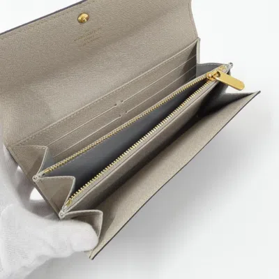 Pre-owned Louis Vuitton Monogram Marron Coated Canvas Long Wallet (bi-fold) () In Brown