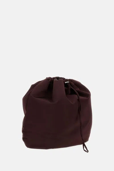 Plan C Bordeaux Round Bag With Drawstring Closure In Red