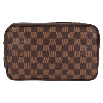 Pre-owned Louis Vuitton Trousse De Toilette Brown Canvas Clutch Bag ()
