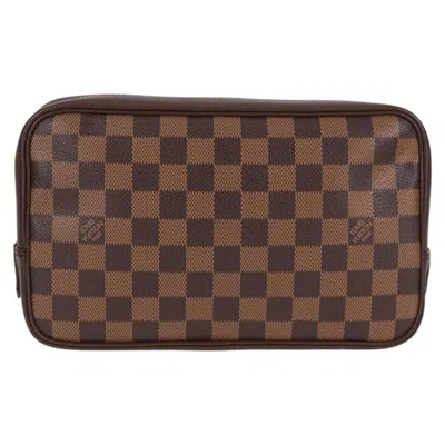 Pre-owned Louis Vuitton Trousse De Toilette Brown Canvas Clutch Bag ()