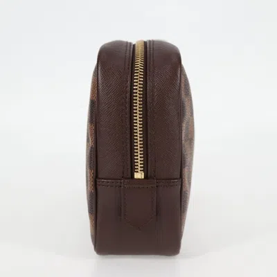 Pre-owned Louis Vuitton Trousse De Toilette Brown Canvas Clutch Bag ()