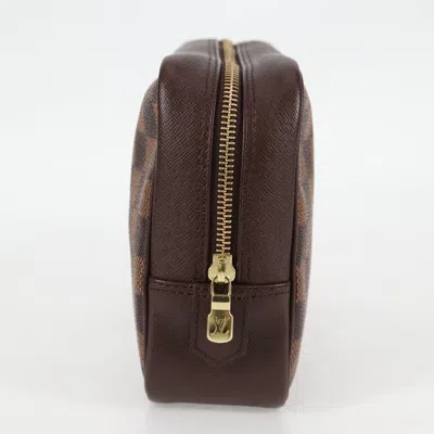 Pre-owned Louis Vuitton Trousse De Toilette Brown Canvas Clutch Bag ()