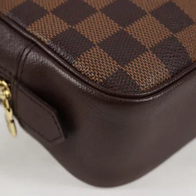 Pre-owned Louis Vuitton Trousse De Toilette Brown Canvas Clutch Bag ()