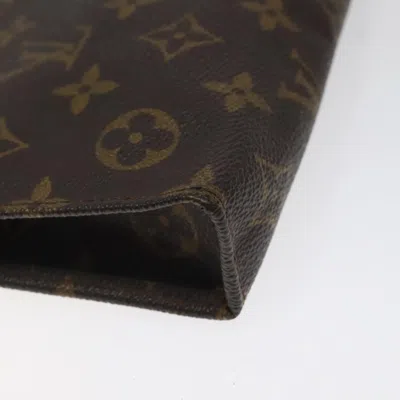Pre-owned Louis Vuitton Trousse De Toilette Brown Canvas Clutch Bag ()