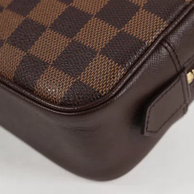 Pre-owned Louis Vuitton Trousse De Toilette Brown Canvas Clutch Bag ()