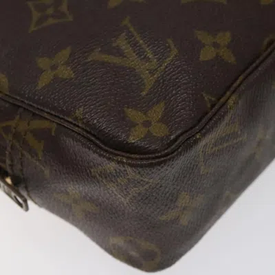 Pre-owned Louis Vuitton Trousse De Toilette Brown Canvas Clutch Bag ()